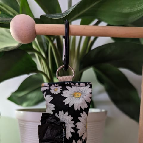 Daisies On Black Dog Waste Bag Dispenser